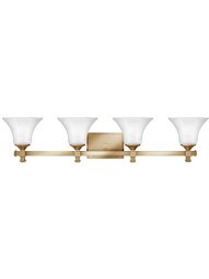 Abbie 4-Light Bath Sconce in Brushed Caramel.